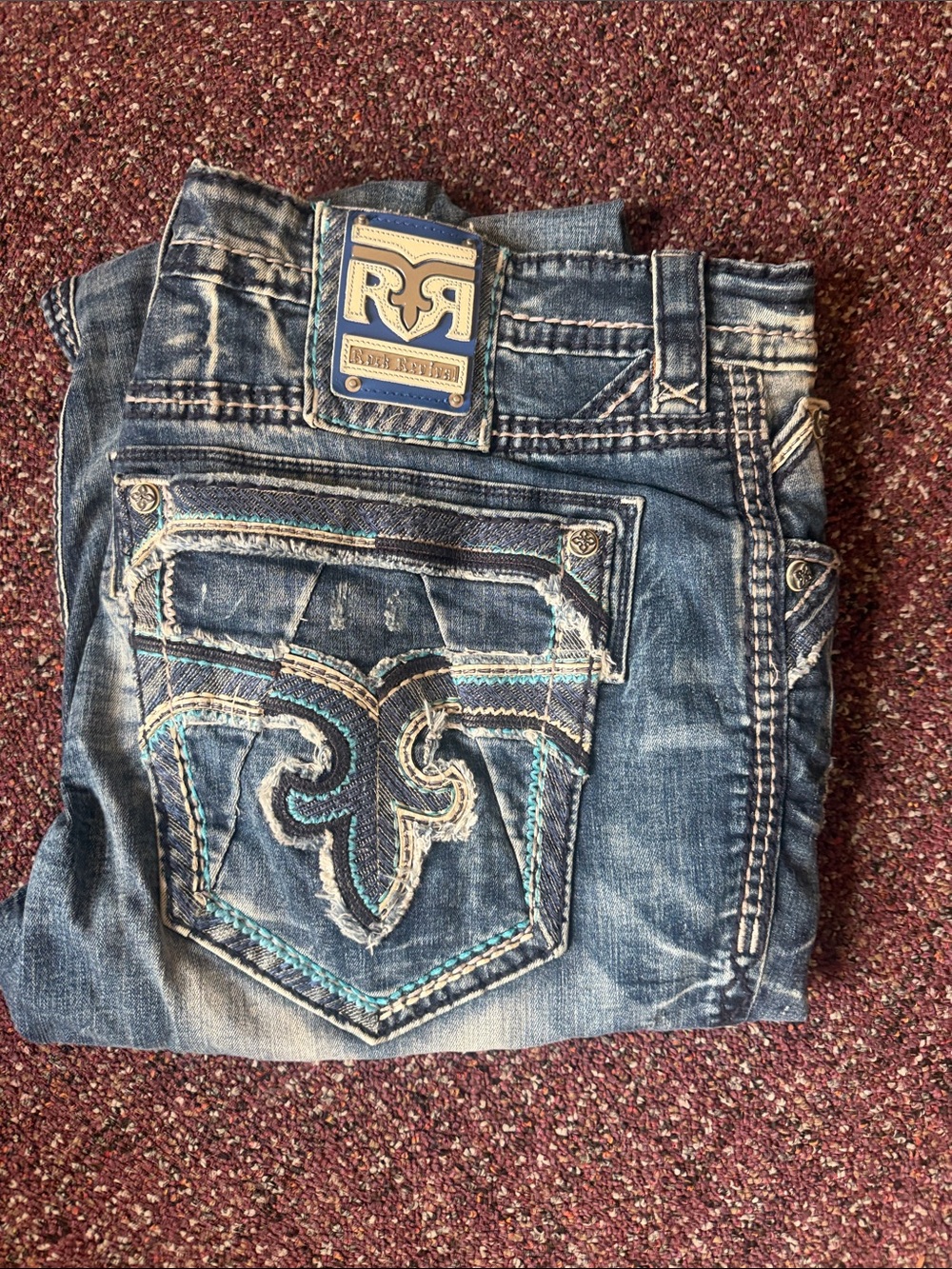 Rock Revival Men’s Distressed Blue Embroidered Pocket Jeans